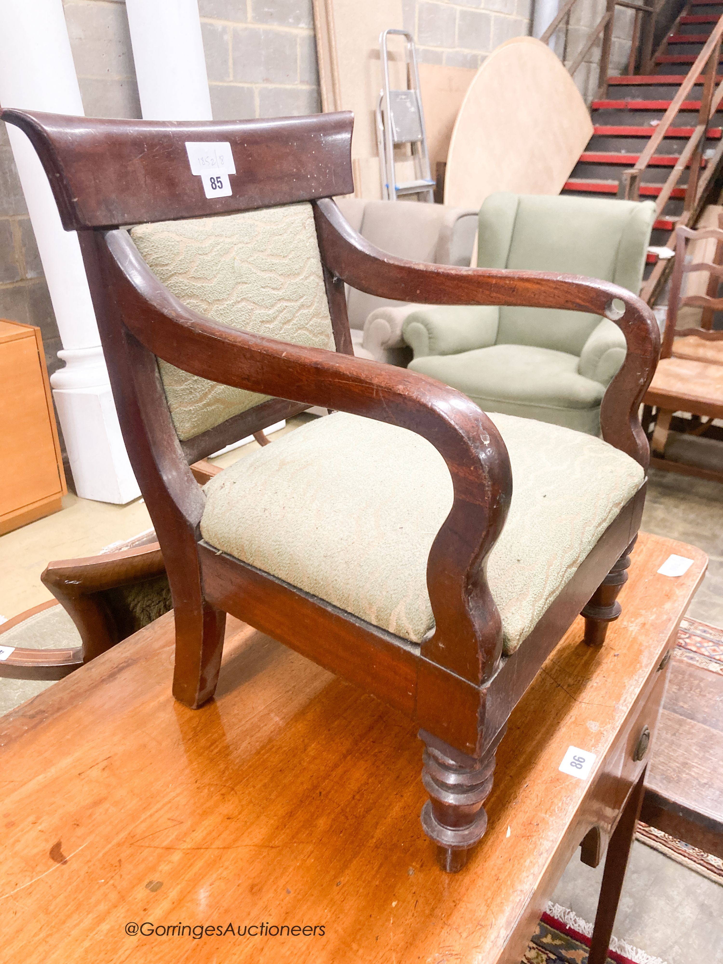 A Victorian mahogany child's elbow chair, width 38cm, height 49cm